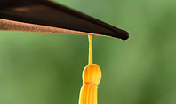 University Graduate Wears Black Cap with Yellow Tassel Presentation Template