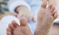 Closeup View of Baby's Toes on Bare Feet Presentation Presentation Template