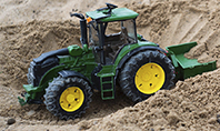 Toy Tractor in Sand Presentation Presentation Template