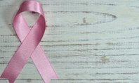 Breast Cancer Pink Ribbon on Wooden Background Presentation Presentation Template