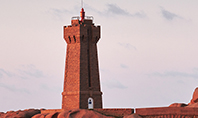 Sunset View of the Ploumanac'h Lighthouse Presentation Presentation Template