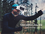 Man Uses a Virtual Reality Headset in the Forest Presentation slide 1