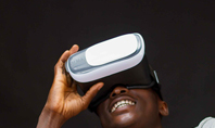 Man Wearing Grey Shirt Using Virtual Reality Headset Presentation Presentation Template
