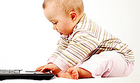 Small Baby with Laptop Presentation Template