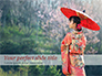 Asian Woman Wearing Traditional Japanese Kimono slide 1