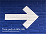Arrow Direction Sign Painted on Blue Wall slide 1