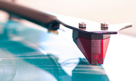 Vinyl Player Stylus on a Rotating Disc Presentation Template