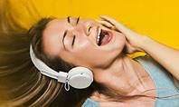 Happy Woman Listening Music in Headphones and Dancing Presentation Template