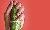 Cucumber in a Man Hand Presentation Template