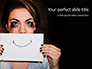 Stressed Woman Holding Sheet of Paper with Hand-Drawn Smile slide 1