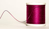 Reel with Burgundy Silk Thread Presentation Template