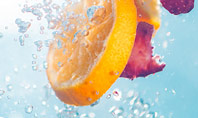 Slices of Fruits in Water Presentation Template