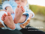 Closeup View of Baby's Toes on Bare Feet Presentation slide 1