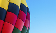 Colorful Hot Air Balloon in Blue Sky Presentation Presentation Template