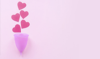 Menstrual Cup with Hearts on Pink Background Presentation Presentation Template