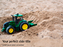 Toy Tractor in Sand Presentation slide 1