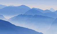 Mountain Peaks in Blue Morning Fog Presentation Presentation Template