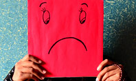 A Man Covering Face with Paper with Sad Face Drawn on It Presentation Presentation Template