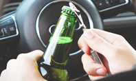A Driver Holding Alcoholic Bottle Presentation Presentation Template