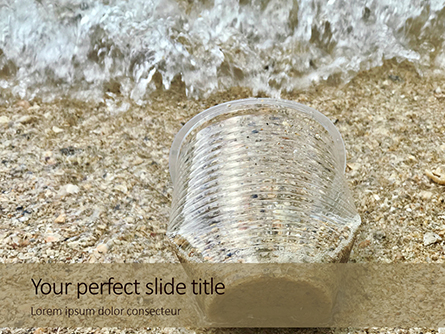 Used Plastic Cup On Sand Presentation Presentation Template, Master Slide