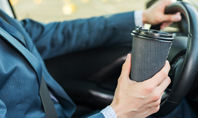 A Businessman Drinking Coffee while Driving a Car Presentation Presentation Template