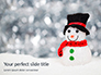 Snowman Against Blurred Festive Bokeh Background Presentation slide 1