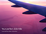 Airplane Wing with Sunrise in Light Flare Presentation slide 1