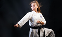 A Martial Arts Woman in White Kimono with Black Belt Presentation Presentation Template