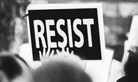 A Protester Raised Banner with Resist Caption Presentation Presentation Template